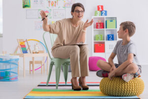 school counselor with young boy